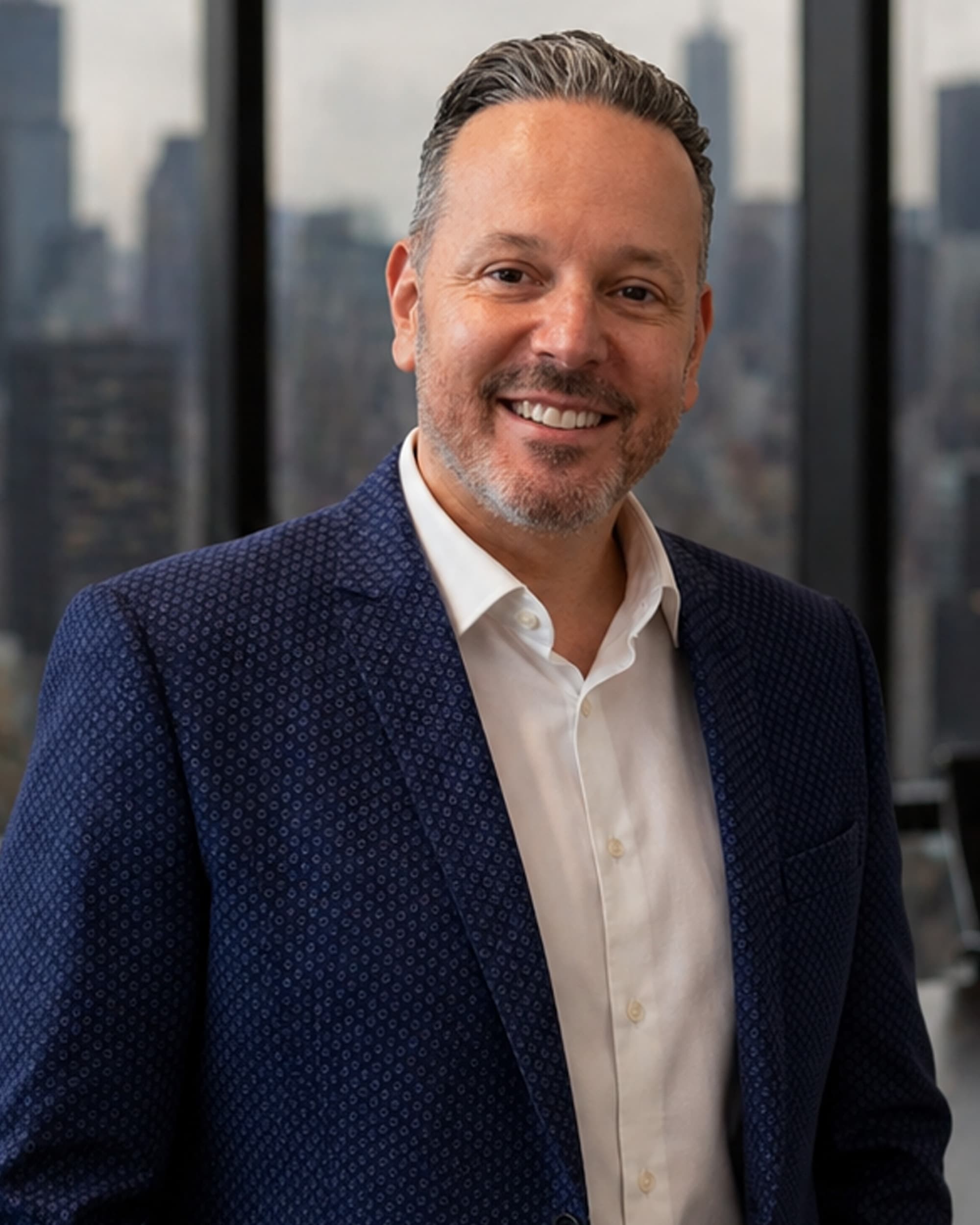 Doron Fetman, photographed against the New York City skyline